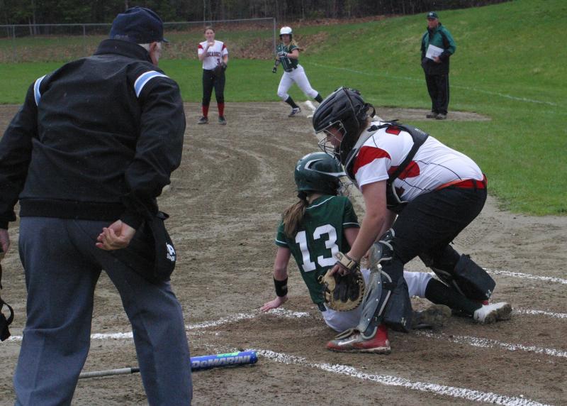 She’s safe! Wolverine catcher Corey Campbell applies the tag but too late as the Winthrop runner scored in Wednesday’s game won by the Ramblers. PHIL DI VECE/Wiscasset Newspaper