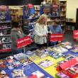 Margie Hodgdon, Molly Carlson and Joshua Golden check out the book selection at the Wiscasset Middle School’s book fair. Courtesy of Wiscasset Middle School 