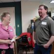 Wiscasset's Vickie Hersom, left, manager of the Bank of Maine's Wiscasset branch, chats with Grover Construction Inc. owner Chet Grover of Wiscasset April 17. The bank was hosting a Wiscasset Area Chamber of Commerce event. SUSAN JOHNS/Wiscasset Newspaper