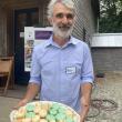 Alain Ollier with macaron. Photo Erica Berman