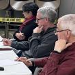 From left: Alna Select Board members Coreysha Stone, Nicholas Johnston, and Steven Graham listen to residents discuss a proposed blasting ordinance. Residents raised concerns about the effects of blasting on groundwater. The select board will discuss a final version of the ordinance, to be considered by voters at Alna's town meeting this March, at their next meeting. Molly Rains photo