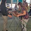 Older students reconstruct a sixteen-foot pilot whale skeleton. Courtesy of CTL