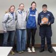 Team seniors honor Laroche-Albert with a signed basketball. CANDI JONETH/Boothbay Register