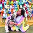 Expressing love during the Early Bird Sale in front of the Buoy Tree. STEVE EDWARDS/Boothbay Register