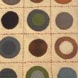 Textile with circles: Donna Strawser's "Big Coin Penny Rug Table Runner." Courtesy of River Arts