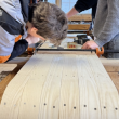 Great Salt Bay students put finishing touches on a white ash toboggan. Courtesy photo