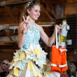 This incredible dress is made out of folded and woven nautical charts 