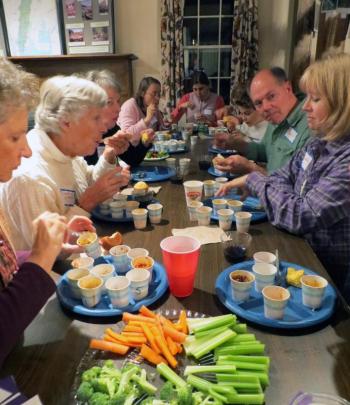 Volunteers try to pick their favorite chili at the annual volunteer appreciation celebration. Courtesy of Sheepscot Valley Conservation Association