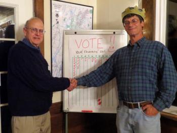 Board President John Atwood, left, congratulates John Wentzel, right, for winning the chili competition at the Sheepscot Valley Conservation Association November 9. Courtesy of Sheepscot Valley Conservation Association 