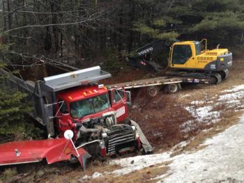 A dump truck driven by William Bailey crashed into an embankment January 30. RYAN LEIGHTON/Boothbay Register