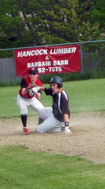  Bryscon Grover applies the tag at second base in Wiscasset’s 5-3 loss to Spruce Mountain. KATHY ONORATO/Wiscasset Newspaper