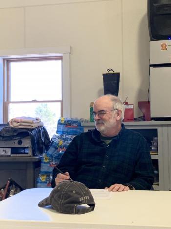 Third Selectman Greg Shute smiles after one of moderator Chris Cooper’s comments. SUSAN JOHNS/Wiscasset Newspaper