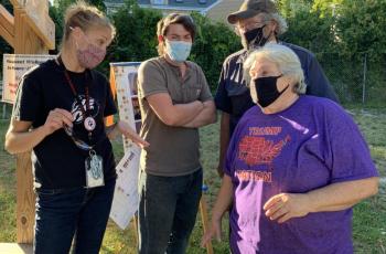 From left, WES staff member Lindsay Larrabee speaks with Robert “B.J.” Larrabee, Bob Blagden and Marla Blagden. SUSAN JOHNS/Wiscasset Newspaper