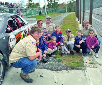 Star Scout Ricky Phillips, "Fast Auntie" Kasie  Kolbe, Ladies Acceleration Tour third place winner, Scout Leader Sierra Cummins-Remington, Dillion Sprague (sibling), Bear Cub Jeffrey Hatt-Blais, Arrow of Light Scout Jereimiah Raposa, Bear Cub Landan LaPierre, Samantha Remington, scoutmaster and cubmaster of Troop and Pack 604, and Parker Sprague (sibling). Courtesy photo 