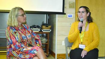 Patrisha McLean listens to Rebekah's final remarks at the Bosarge Education Center at CMBG as part of the Finding Our Voices Let's Talk About It event Sept. 11. LISA KRISTOFF/Boothbay Register