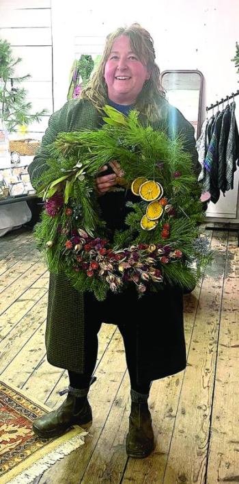 Treats wreath held by designer Brie Soares. Tim Peltzer photo