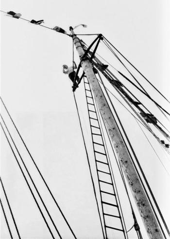 A crew member high up in the rigging of the Bowdoin's rear mast. PHIL DI VECE photo