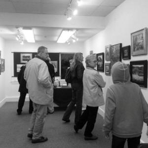 Art patrons visit the first-ever Plein Air Art Exhibit at the Boothbay Region Art Foundation Gallery. Courtesy of Corinne McIntyre