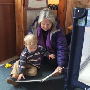 Ethel Stansfield reads to a child. Audrey Latella/Sheepscot Valley Children’s House photo Ethel Stansfield reads to a child. Audrey Latella/Sheepscot Valley Children’s House photo