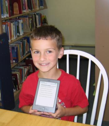 Kindle drawing winners Chance, right, a third grader at the Wiscasset Primary School, and Josh, below, a fifth grader at Wiscasset Middle School. The drawing marked the end of the Dream Big-Read Summer Reading Program at the Wiscasset Public Library.